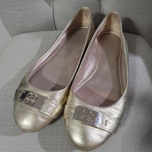 Gold COACH flats